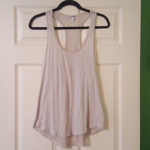 Racer-back tank with mesh back.